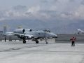 BAGRAM AIR BASE, Afghanistan Ã± Senior Airman Troy Brown marshals an A-10 Thunderbolt II onto the end of the runway for de-arming after a combat sortie. Airman Brown and the A-10 are deployed from Spangdahlem Air Base, Germany. (U.S. Air Force photo/Capt. Jennifer Gurganus)