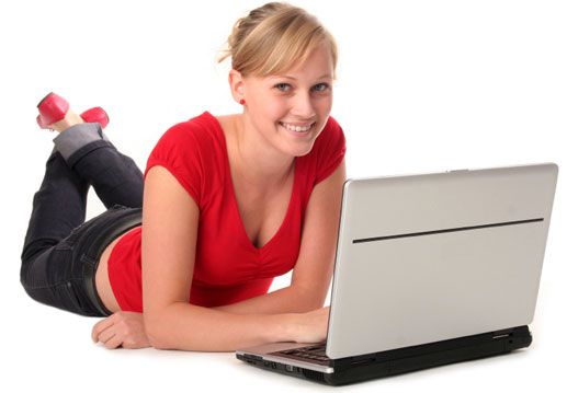 girl in red using laptop