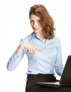 girl pointing at computer